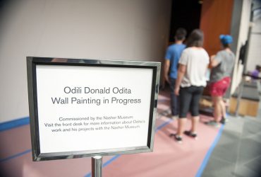 Work begins on Odili Donald Odita's wall painting, "Shadow and Light (For Julian Francis Abele)," 2015. Photo by J Caldwell.