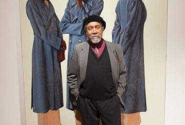 Artist Barkley L. Hendricks poses in front of his work. Photo by J Caldwell.