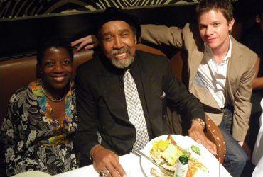 Thelma Golden, director of the Studio Museum in Harlem, with Barkley L. Hendricks and Trevor Schoonmaker. Photo by Wendy Hower.