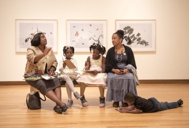 Visitors enjoy conversation and gallery activities within All Matterings of Mind during a Family Day event. Photo by J Caldwell.