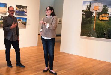 Durham artist Bill Bamberger (left) meets with student co-curator Brittany Halberstadt in the gallery. Photo by J Caldwell.