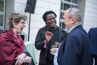 Nasher Museum Director Sarah Schroth shares a laugh with artist John Akomfrah and Duke graduate Blake Byrne.