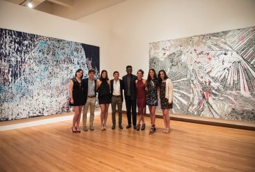 Nasher MUSE students strike a pose with two works by Mark Bradford in Solidary & Solitary.