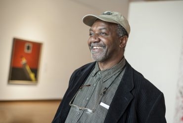 Kerry James Marshall delivered Barbra and Andrew Rothschild Lecture at the Nasher Museum on October 10, 2012. On that occasion, he signed the painting, Portrait of the Artist & a Vacuum. Photo by J Caldwell.