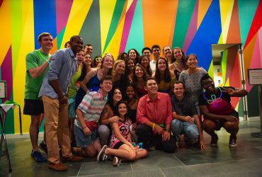 Duke Students pose in front of Odili Donalt Odita's "Shadow and Light (For Julian Francis Abele)." Photo by Megan Mendenhall.