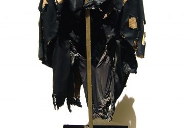 Marta Minujín, Frac-asado (Grilled-Tuxedo), 1975. Mixed-media dress on stand and metal crown of thorns, 62.5 inches (158.75 cm), overall. Estrellita B. Brodsky Collection. Image courtesy of the artist and Henrique Faria Fine Art, New York, New York, and Buenos Aires, Argentina.