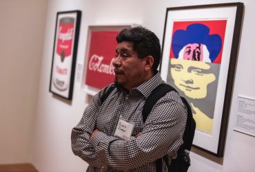 Durham artist Cornelio Campos attends the media preview of Pop América. Photo by J Caldwell.