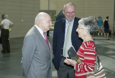 Blake Byrne shakes the hand of museum benefactor and namesake Raymond D. Nasher during the opening of the museum in October 2005. Photo by Duke Photography.