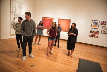 Candice Hopkins leads a tour for Duke University students