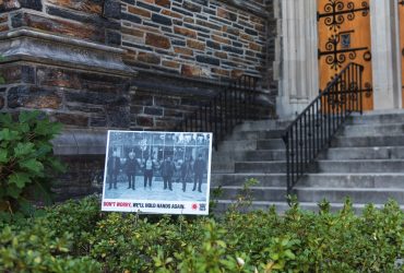 A lawn sign from RESIST COVID / TAKE 6! at the Duke Chapel. Courtesy of Carrie Mae Weems.