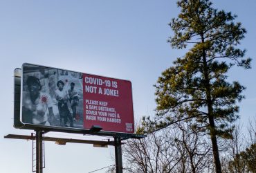 A RESIST COVID / TAKE 6! billboard in Durham, NC. Courtesy of Carrie Mae Weems.