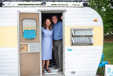 President Vincent Price and his wife Annette Price in the Radical Repair Workshop camper on the Nasher piazza