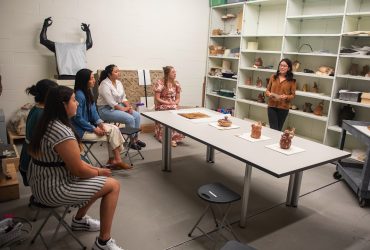 Diana Sanchez gives a presentation to museum colleagues about her research