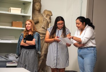 Museum staff respond to Diana Sanchez's presentation in study storage