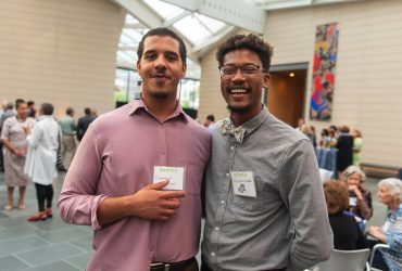 Aaron Colston and a friend enjoy the evening