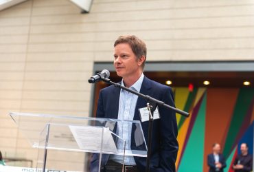 Nasher Museum Director Trevor Schoonmaker addresses the crowd at the Director's Preview event for Roy Lichtenstein: History in the Making, 1948-1960