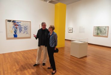 Jack Cowart, founding executive director of the Roy Lichtenstein Foundation, visits the galleries with his partner Susan