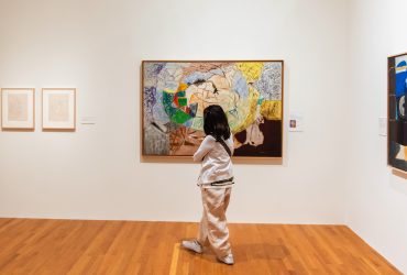 A visitors explores "Roy Lichtenstein: History in the Making, 1948 — 1960"