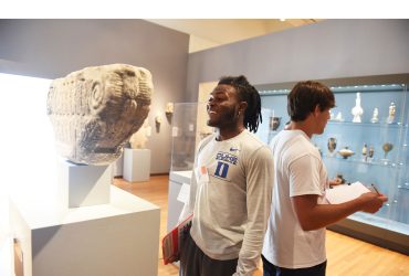 About 20 first-year Duke football players visit the Nasher Museum to tour galleries