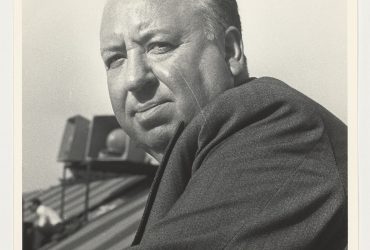 Erika Stone, Alfred Hitchcock, 1950s (printed later). Gelatin silver print, 10 x 8 inches (25.4 x 20.32 cm). Collection of the Nasher Museum of Art at Duke University. Gift of Charles (A.B.’84) and Linda Googe, 2021.30.32. © Erika Stone.