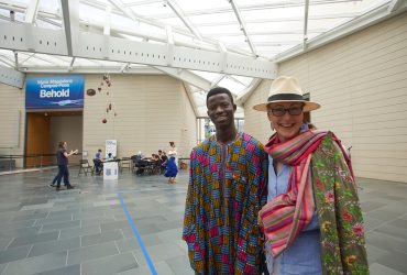 Smiling visitors in the great hall during the third annual Nasher Community Celebration