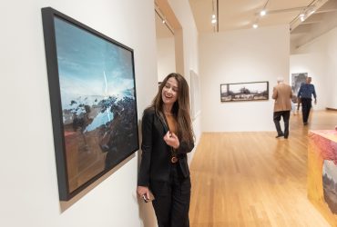 Second Nature artist Acacia Johnson leads an impromptu tour during the recent Director's Preview