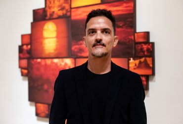 Artist João Castilho with his work in the exhibition Second Nature